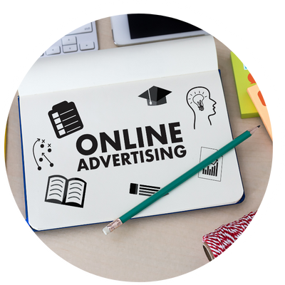 Creative team planning multi-channel advertising campaigns